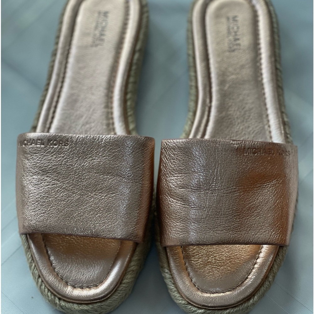 Michael Kors women rose gold colored slides. Size 8.5M. Never worn. All leather